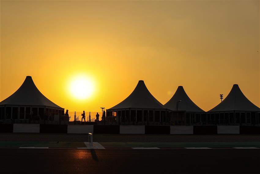 Saudi Arabian yellow sun set with tents